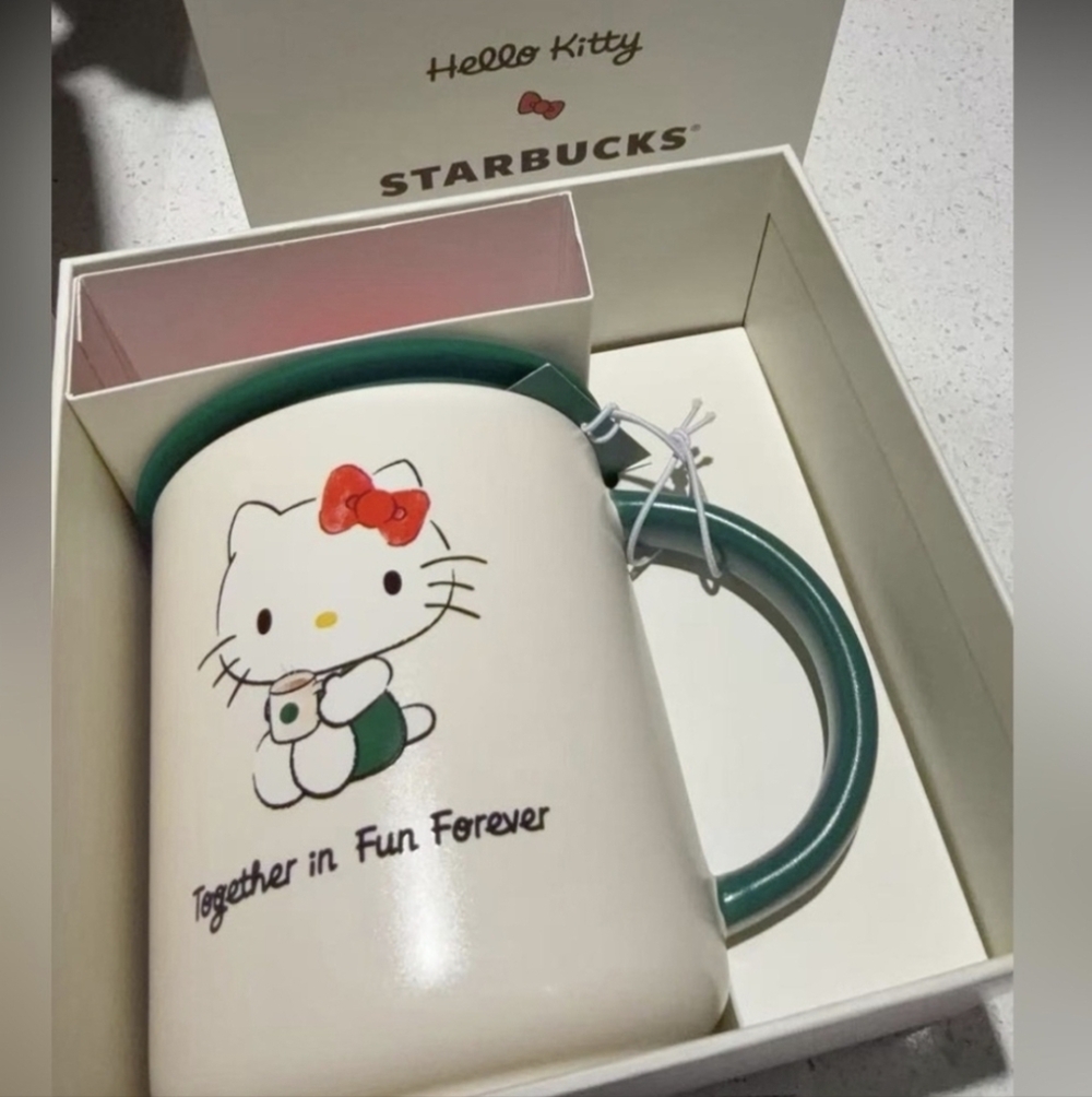 Starbucks Hello Kitty Mug with Teal Handle